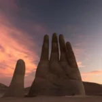 Mano del Desierto main dans le désert atacama chili coucher de soleil