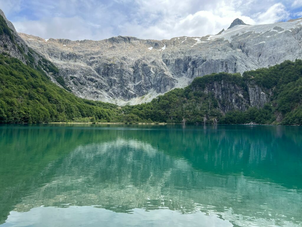 a large body of water surrounded by mountains in futaleufu chile